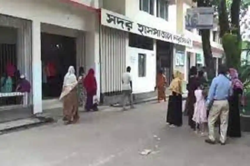 People waiting outside Sadur Sadar Hospital in Bangladesh. Channel i News - চ্যানেল আই নিউজ