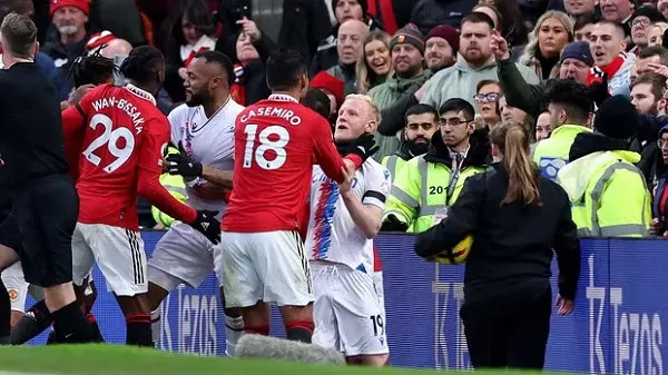 Manchester United players celebrating with fans after a match. Channel i News - চ্যানেল আই নিউজ