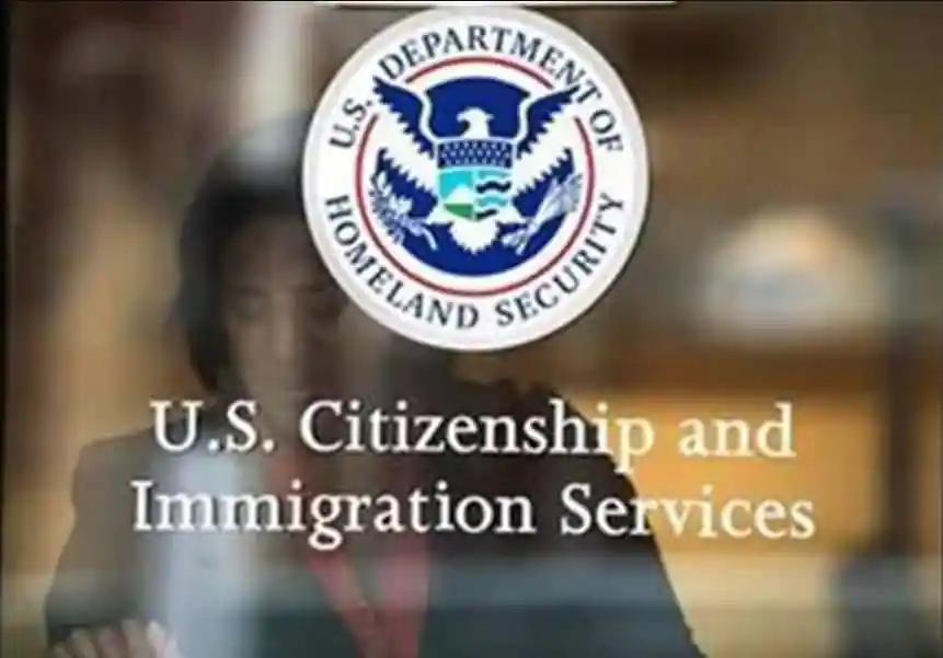 U.S. Citizenship and Immigration Services logo with Bengali news context. Channel i News - চ্যানেল আই নিউজ