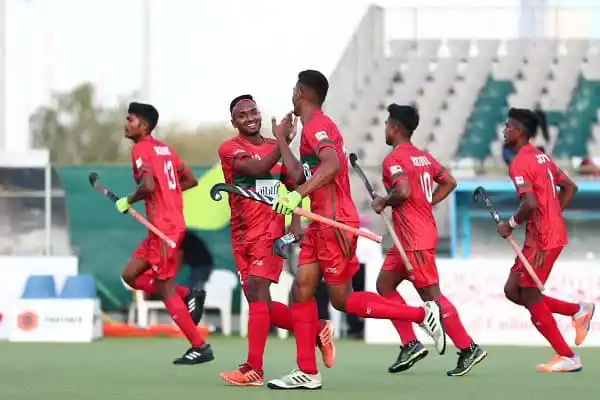 বাংলাদেশ হকি দলের খেলোয়াড়রা মাঠে উল্লাস করছে. Channel i News - চ্যানেল আই নিউজ