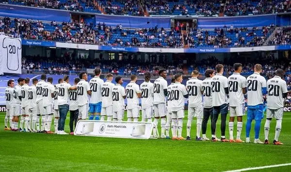 Real Madrid players line up before a match at the Santiago Bernabéu stadium. Channel i News - চ্যানেল আই নিউজ