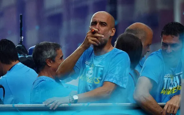 Manchester City players celebrate their treble win after rain in Manchester. Channel i News - চ্যানেল আই নিউজ