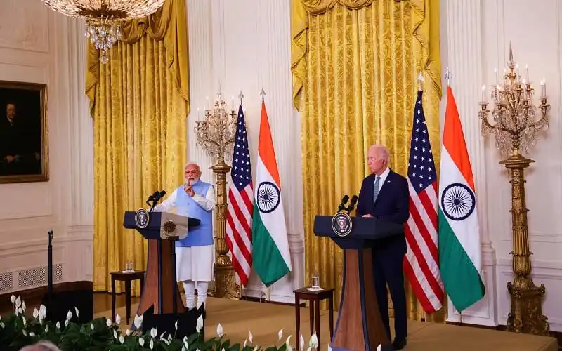 মোদি ও বাইডেন যৌথ বিবৃতিতে ভারতের ও মার্কিন যুক্তরাষ্ট্রের পতাকা দেখা যাচ্ছে।. Channel i News - চ্যানেল আই নিউজ