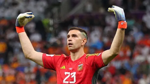 Spanish footballer Sergio Ramos celebrating on the field in a red jersey. Channel i News - চ্যানেল আই নিউজ