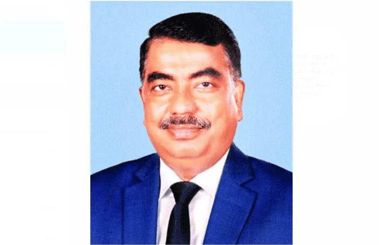 বাংলাদেশি ব্যক্তি পেশাদার পোশাকে, হাসিমুখে ছবি. Channel i News - চ্যানেল আই নিউজ