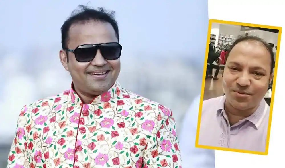 বাংলাদেশি ব্যক্তি, হাসিমুখ, ফুলের শার্ট পরা, sunglasses. Channel i News - চ্যানেল আই নিউজ