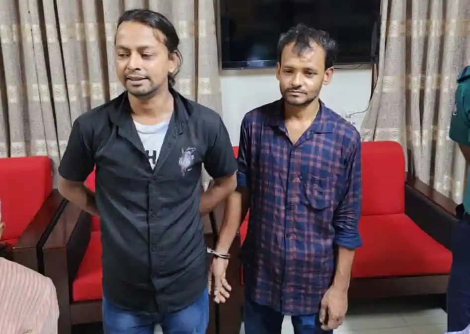 দুই ব্যক্তি সংবাদ সম্মেলনে অংশগ্রহণ করছেন. Channel i News - চ্যানেল আই নিউজ