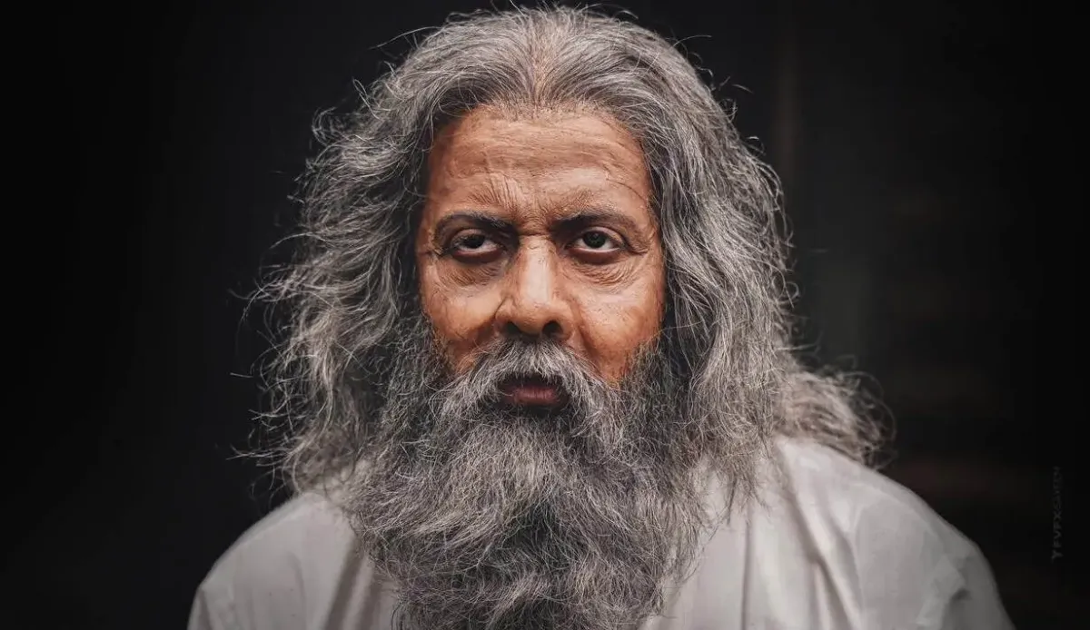 বৃদ্ধ পুরুষের মুখের ছবি, দীর্ঘ ধূসর চুল ও দাড়ি সহ. Channel i News - চ্যানেল আই নিউজ