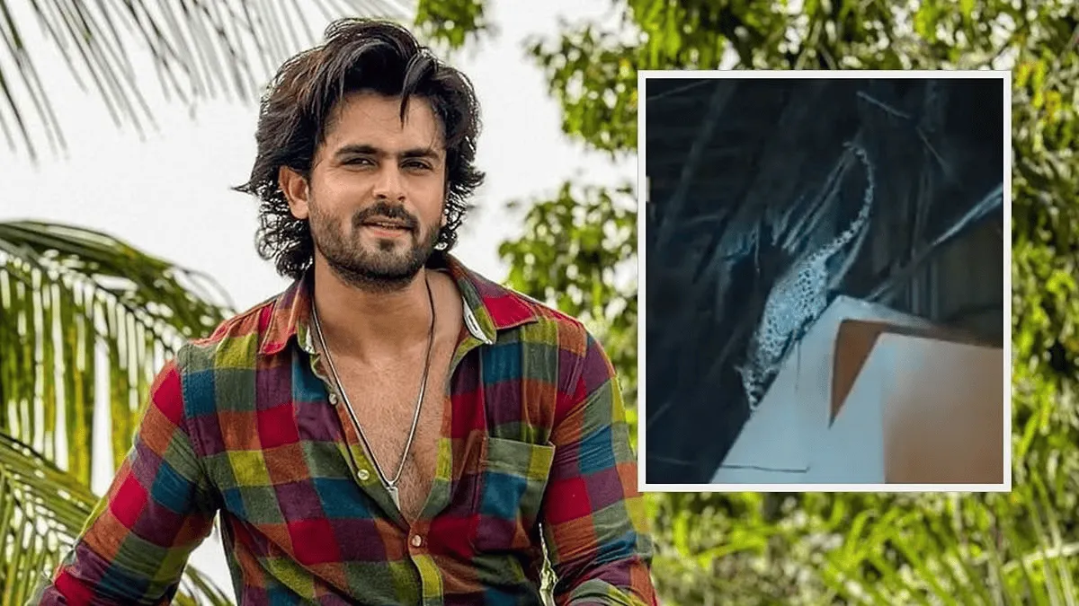 Young man with long hair and beard in colorful shirt outdoors. Channel i News - চ্যানেল আই নিউজ