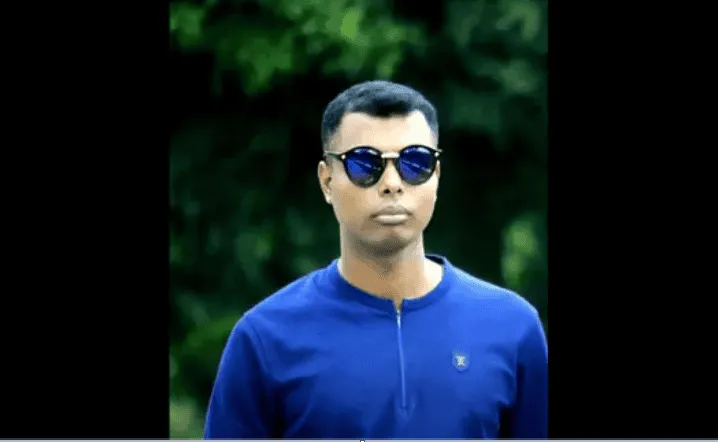 সেনা সদস্যের ছবি, কালো চশমা পরা, নীল পোশাক পরিহিত. Channel i News - চ্যানেল আই নিউজ