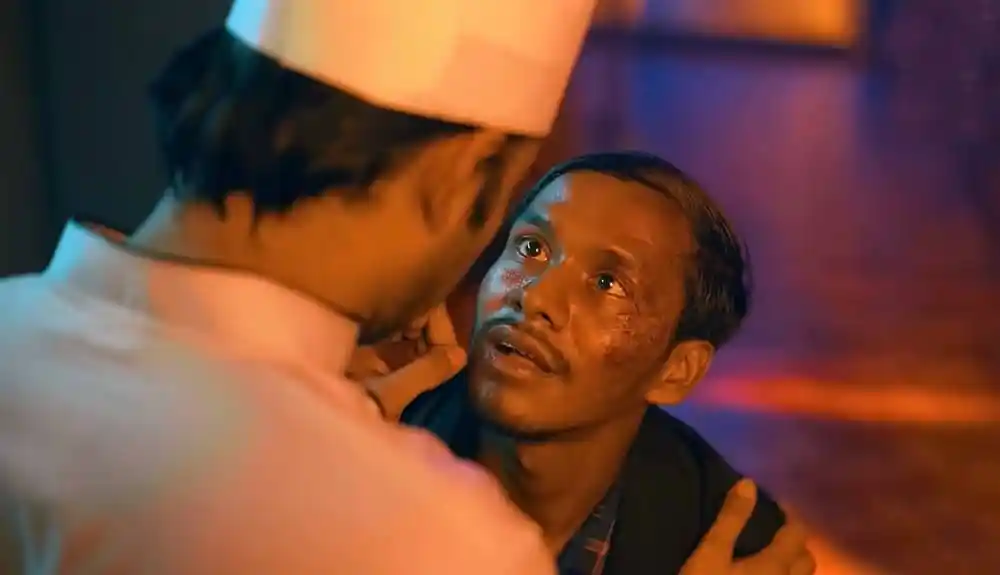 দুই ব্যক্তি গভীর আলোচনায় ব্যস্ত, একজনের চোখে গভীর অনুভূতি. Channel i News - চ্যানেল আই নিউজ
