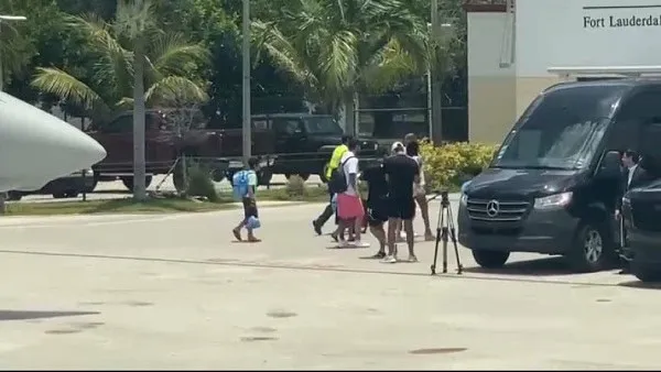 People boarding a private jet at Fort Lauderdale airport in sunny weather. Channel i News - চ্যানেল আই নিউজ