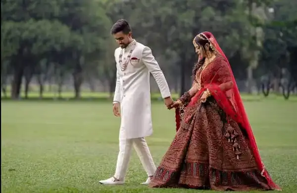 আকবর আলী ও তার স্ত্রীর বিবাহের ছবি, সুন্দর পোশাক পরা দম্পতি. Channel i News - চ্যানেল আই নিউজ