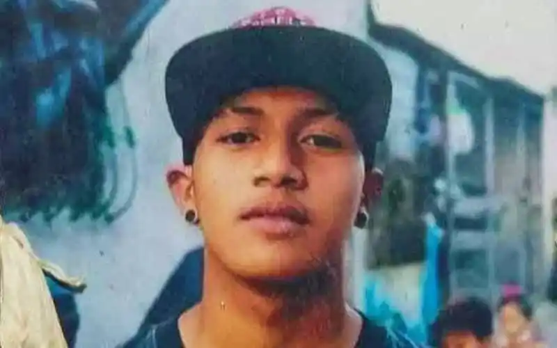 Young boy wearing a cap, looking at the camera. Channel i News - চ্যানেল আই নিউজ