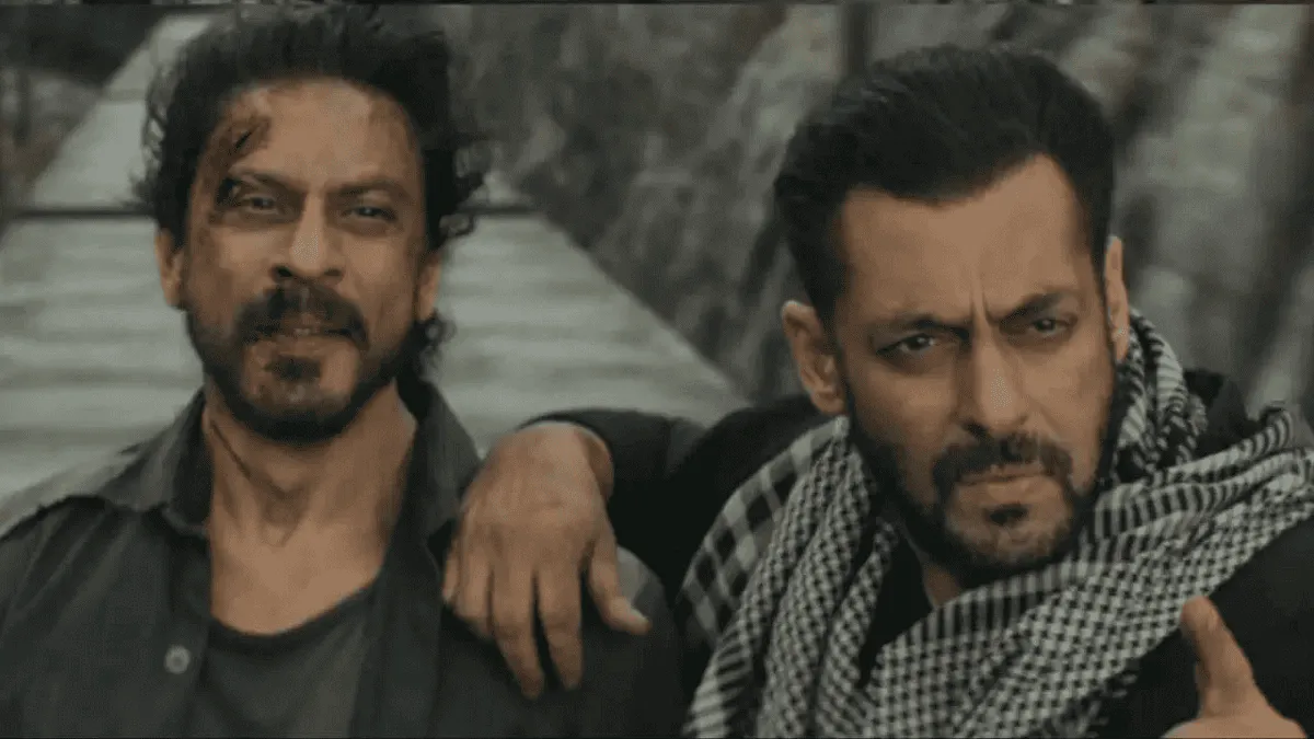 দুই পুরুষের ছবি, একটির হাতে অন্যের কাঁধে হাত, গম্ভীর মুখাবয়ব. Channel i News - চ্যানেল আই নিউজ