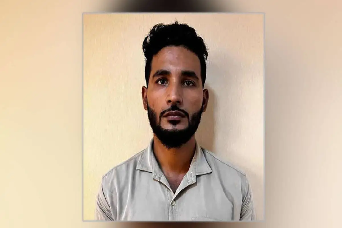 Portrait of a young man with black hair and beard in a light-colored shirt. Channel i News - চ্যানেল আই নিউজ