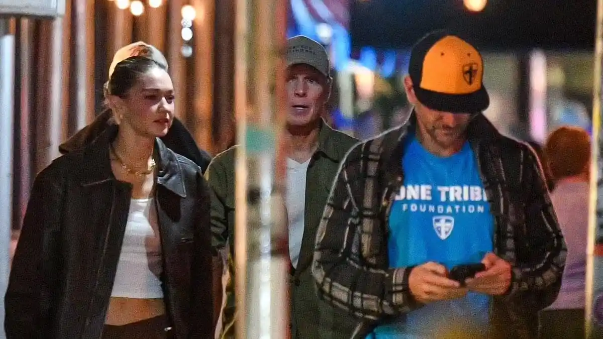 Bradley Cooper with a woman during a dinner date at night. Channel i News - চ্যানেল আই নিউজ