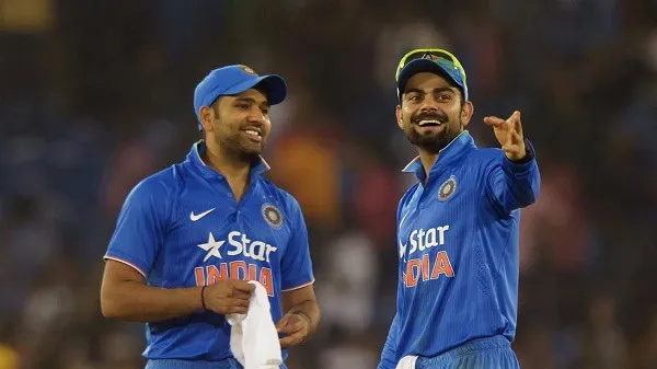 ভারতীয় ক্রিকেটাররা মাঠে উল্লাস করছে, কোহলি ও রোহিতের ছবি. Channel i News - চ্যানেল আই নিউজ