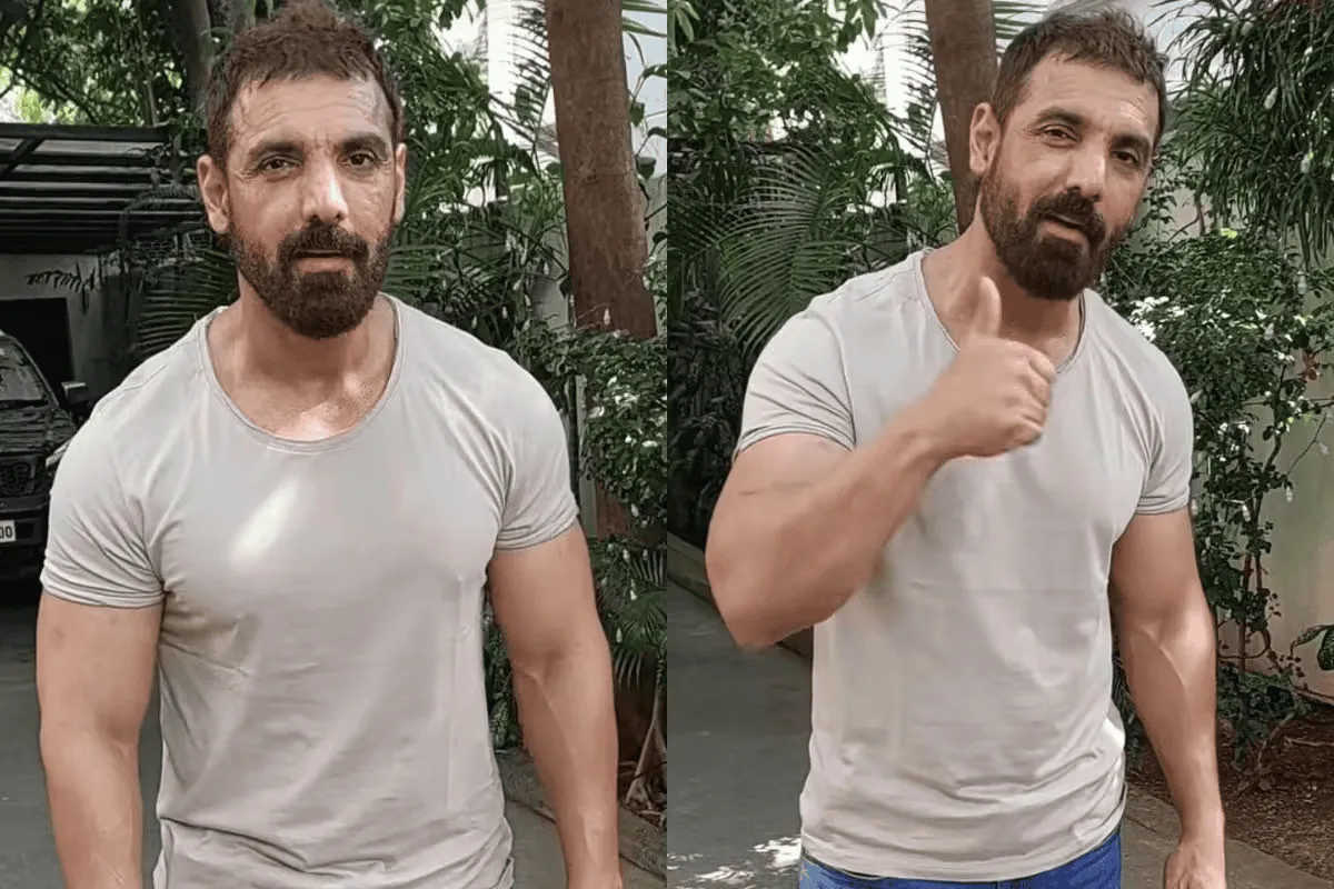 আদমি ব্যক্তি গাছের পাশে দাঁড়িয়ে, একটিতে হাত দেখাচ্ছে।. Channel i News - চ্যানেল আই নিউজ