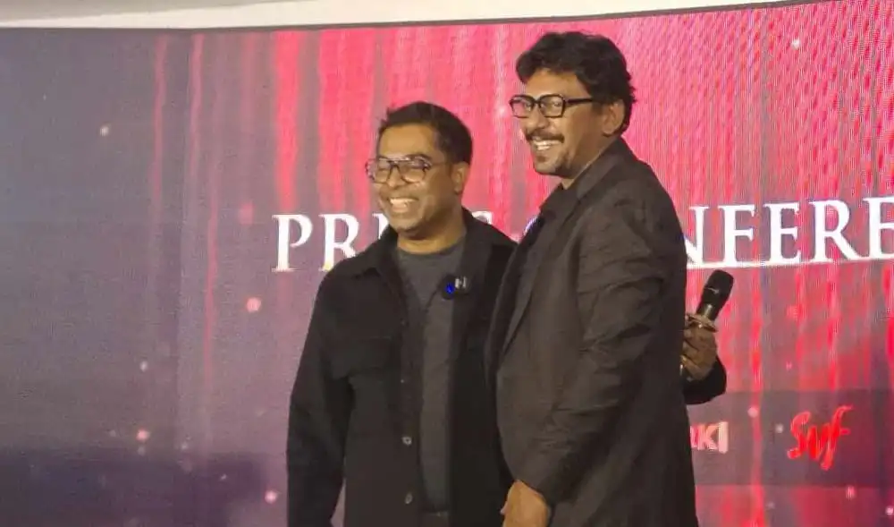 চ্যানেল আই অনলাইন অনুষ্ঠানে দুই ব্যক্তি হাসিমুখে উপস্থিত. Channel i News - চ্যানেল আই নিউজ