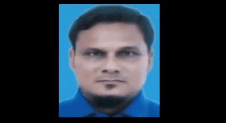 প্রফাইল ছবি of a man with dark hair and a beard against a blue background. Channel i News - চ্যানেল আই নিউজ