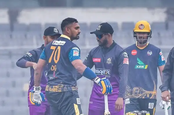 Bangladeshi cricket players in team uniform during a match. Channel i News - চ্যানেল আই নিউজ