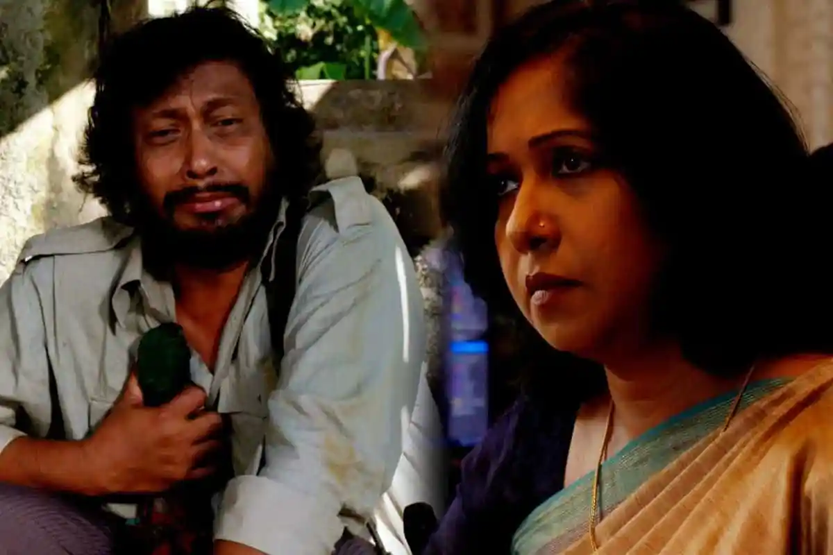 দুজন ব্যক্তি, একজন পুরুষ ও একজন মহিলা, আলোচনা করছেন. Channel i News - চ্যানেল আই নিউজ