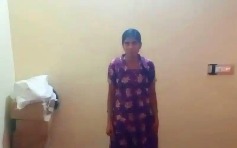 বাড়ির ভিতরে এক নারী, তার মুখে উদ্বেগের ছাপ. Channel i News - চ্যানেল আই নিউজ