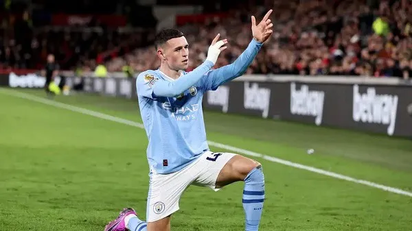Manchester City player celebrating a goal during a match. Channel i News - চ্যানেল আই নিউজ