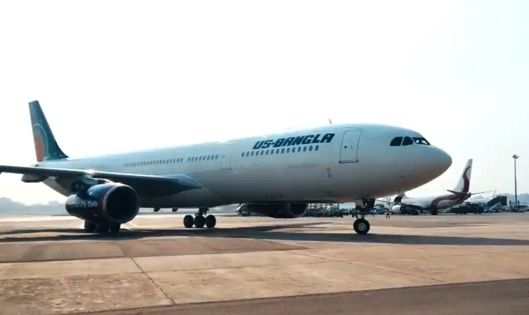US-Bangla Airlines aircraft on the runway at an airport. Channel i News - চ্যানেল আই নিউজ