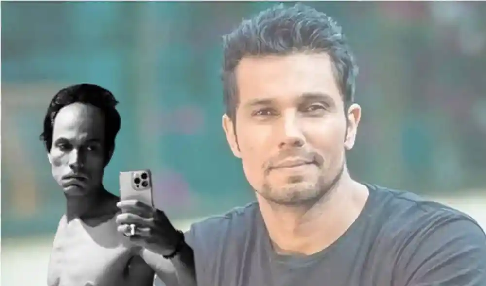 একজন ব্যক্তি মোবাইল ফোনে ছবি তোলার সময় অন্যজনের ছবি ধারণ করছে. Channel i News - চ্যানেল আই নিউজ