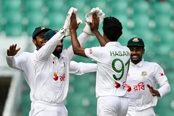বাংলাদেশ ক্রিকেটাররা উল্লাসে একে অপরকে অভিনন্দন জানাচ্ছেন. Channel i News - চ্যানেল আই নিউজ