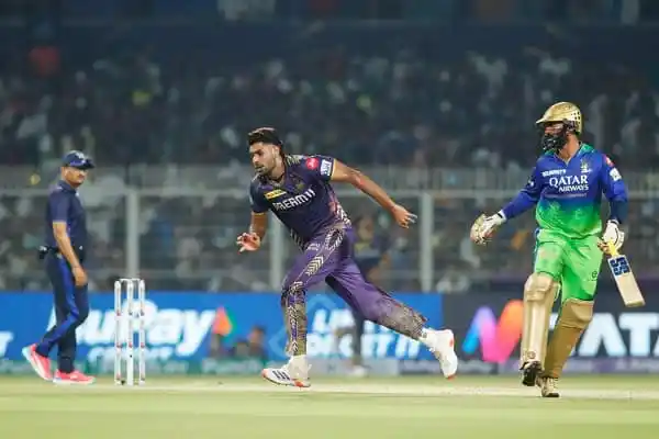 Kolkata Knight Riders player runs between wickets during a match. Channel i News - চ্যানেল আই নিউজ
