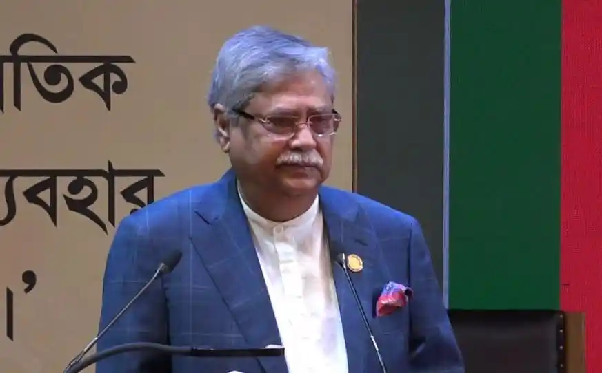 Bangladeshi politician speaking at a press conference or event. Channel i News - চ্যানেল আই নিউজ