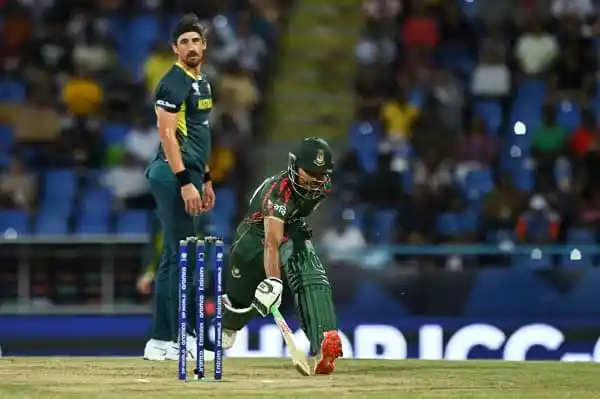 বাংলাদেশি ক্রিকেটার শান্ত ব্যাটিং করছেন, বিপক্ষ দলের ফিল্ডার মাঠে দাঁড়িয়ে. Channel i News - চ্যানেল আই নিউজ