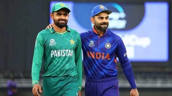 Pakistani and Indian cricket players smiling after match, celebrating friendship. Channel i News - চ্যানেল আই নিউজ