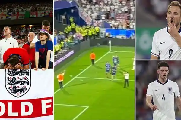 England football players and fans during a match, with a penalty kick in progress. Channel i News - চ্যানেল আই নিউজ