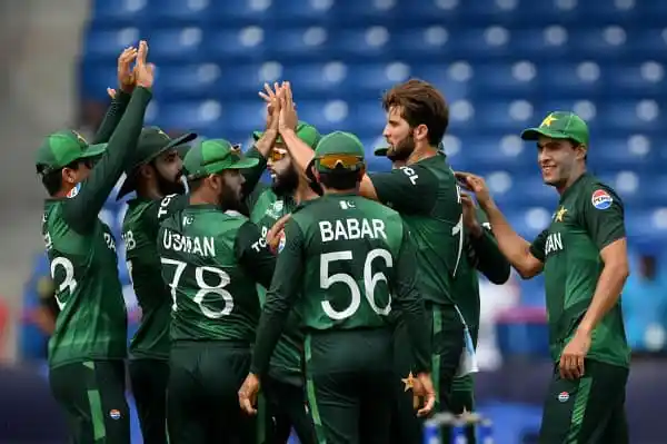 Pakistani cricket team celebrating during a match. Channel i News - চ্যানেল আই নিউজ