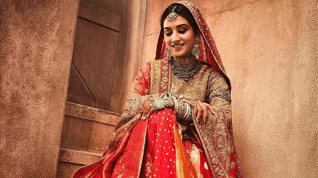 রাধিকা বিয়ের পোশাকে রঙিন লেহেঙ্গা ও জুয়েলারি পরিহিত. Channel i News - চ্যানেল আই নিউজ