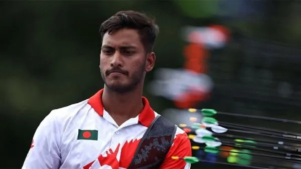 অলিম্পিকে বাংলাদেশের পতাকা হাতে একজন খেলোয়াড়ের ছবি. Channel i News - চ্যানেল আই নিউজ