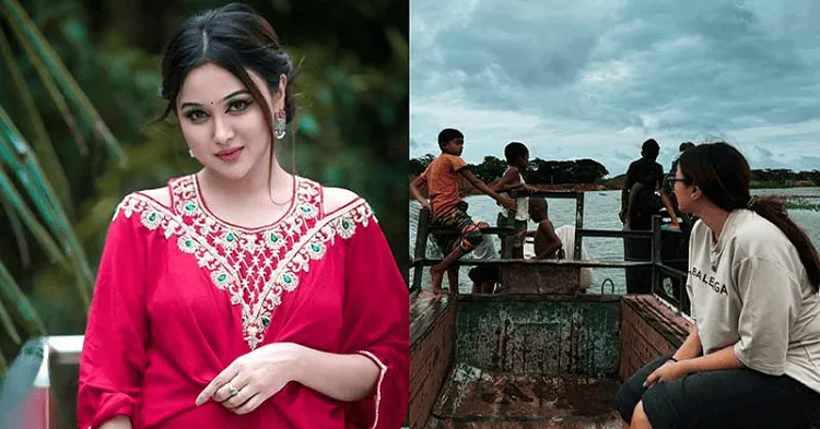 বন্যার পানিতে নৌকায় বসে পর্যবেক্ষণ করছে একদল মানুষ. Channel i News - চ্যানেল আই নিউজ