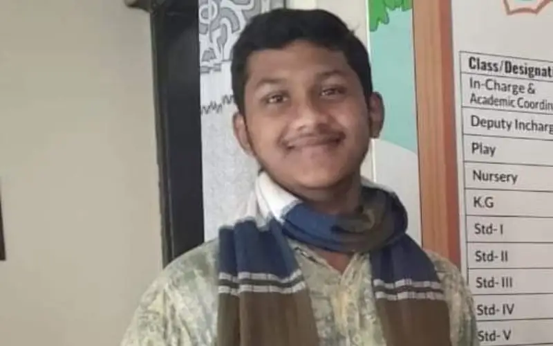 Smiling young boy in school uniform at educational institute in Bangladesh. Channel i News - চ্যানেল আই নিউজ