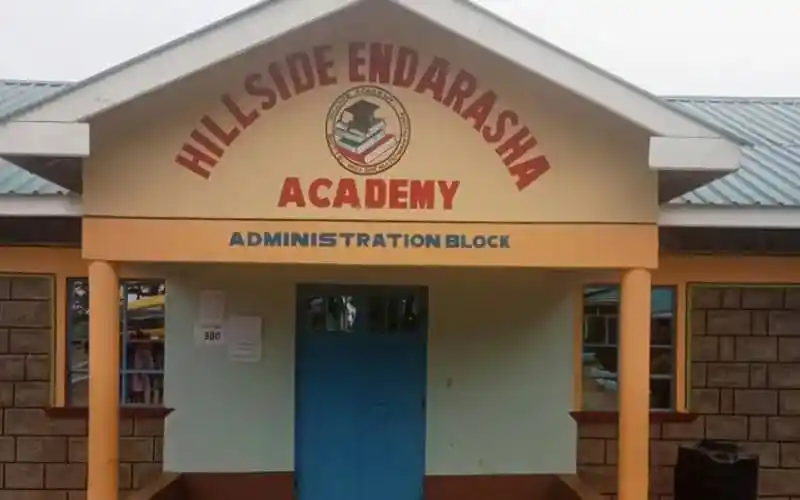 Hillside Endarashia Academy school entrance with sign and blue door. Channel i News - চ্যানেল আই নিউজ