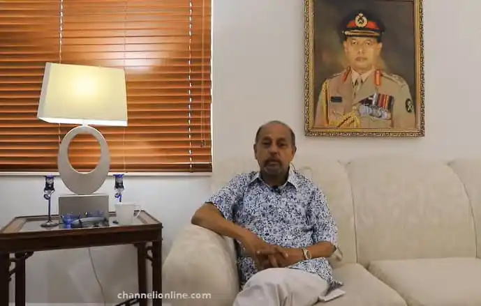 বাংলাদেশের একজন ব্যক্তি বসে আছেন আধুনিক লিভিং রুমে. Channel i News - চ্যানেল আই নিউজ