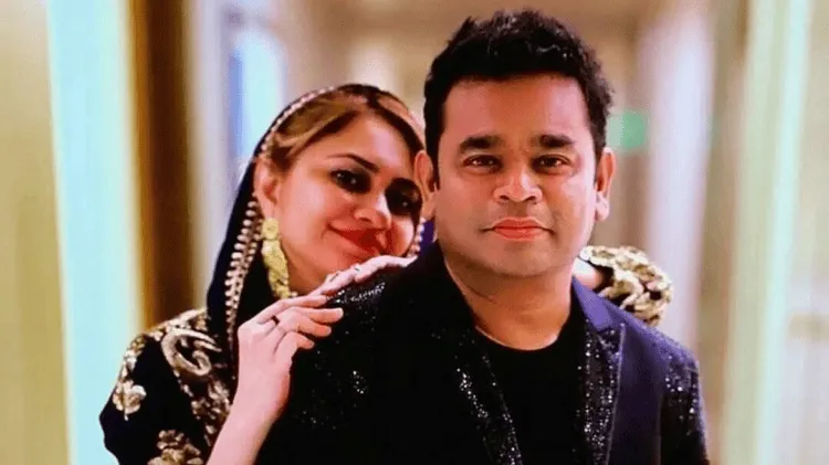 দম্পতি হাসিমুখে ছবি, নারীর হাত স্বামীর কাঁধে রাখছেন. Channel i News - চ্যানেল আই নিউজ