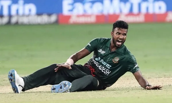 Cricket player sliding on the field during a match in Bangladesh. Channel i News - চ্যানেল আই নিউজ