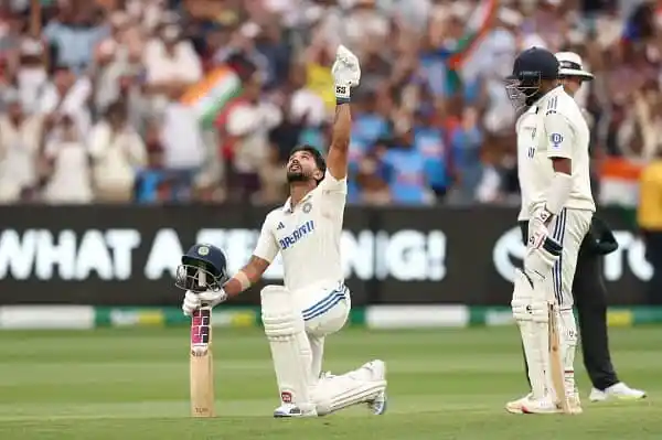 ক্রিকেটার নীতিশের সেঞ্চুরি উদযাপন, মাঠে খেলা চলমান. Channel i News - চ্যানেল আই নিউজ