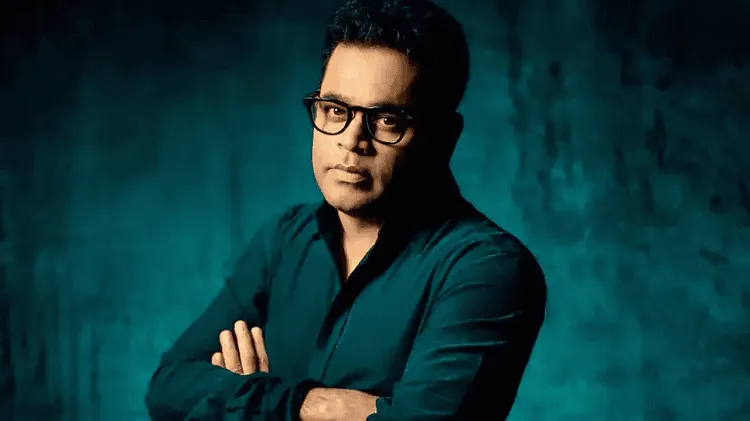 রহমানের পোর্ট্রেট, তিনি কালো পোশাক ও চশমা পরেছেন. Channel i News - চ্যানেল আই নিউজ