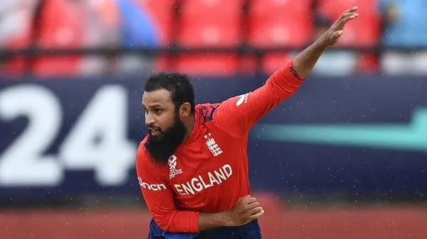 England cricketer celebrating during a match in red jersey. Channel i News - চ্যানেল আই নিউজ