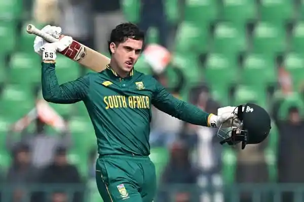 South African cricketer celebrating after scoring a century in a match. Channel i News - চ্যানেল আই নিউজ